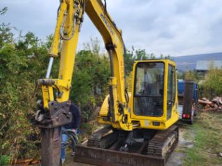 ექსკავატორი კოდალით სურათი 2