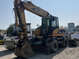 ექსკავატორი ტრაქტორები სურათი 2