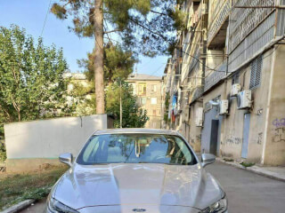 ქირავდება Ford Fusion Hybrid მძღოლით 